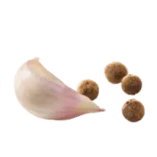 schwebende Knoblauchzehe mit Pimentkörner